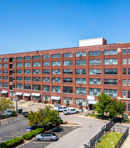a large building with a lot of windows on the side of it