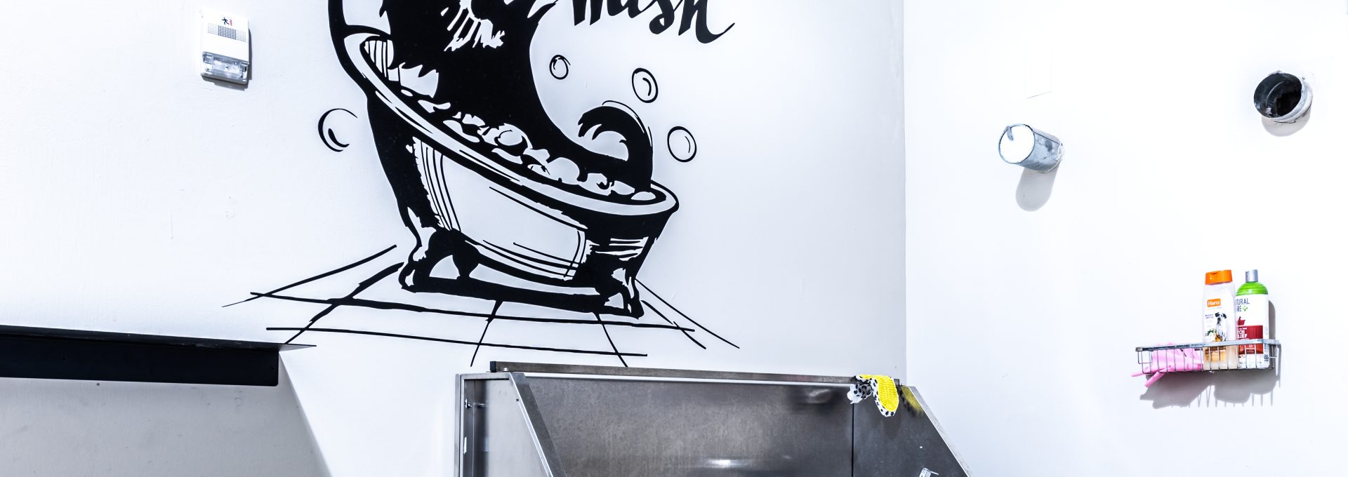 a kitchen with a sink and a microwave